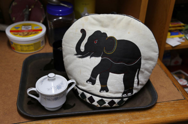Our pachyderm tea cozy keeps the teapot warm for visitors.