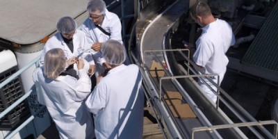 Epidemiologists track specimens in a log as they are collected.