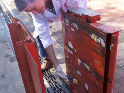 Milk crates had to slide through here during the dysfunctional decontamination process.